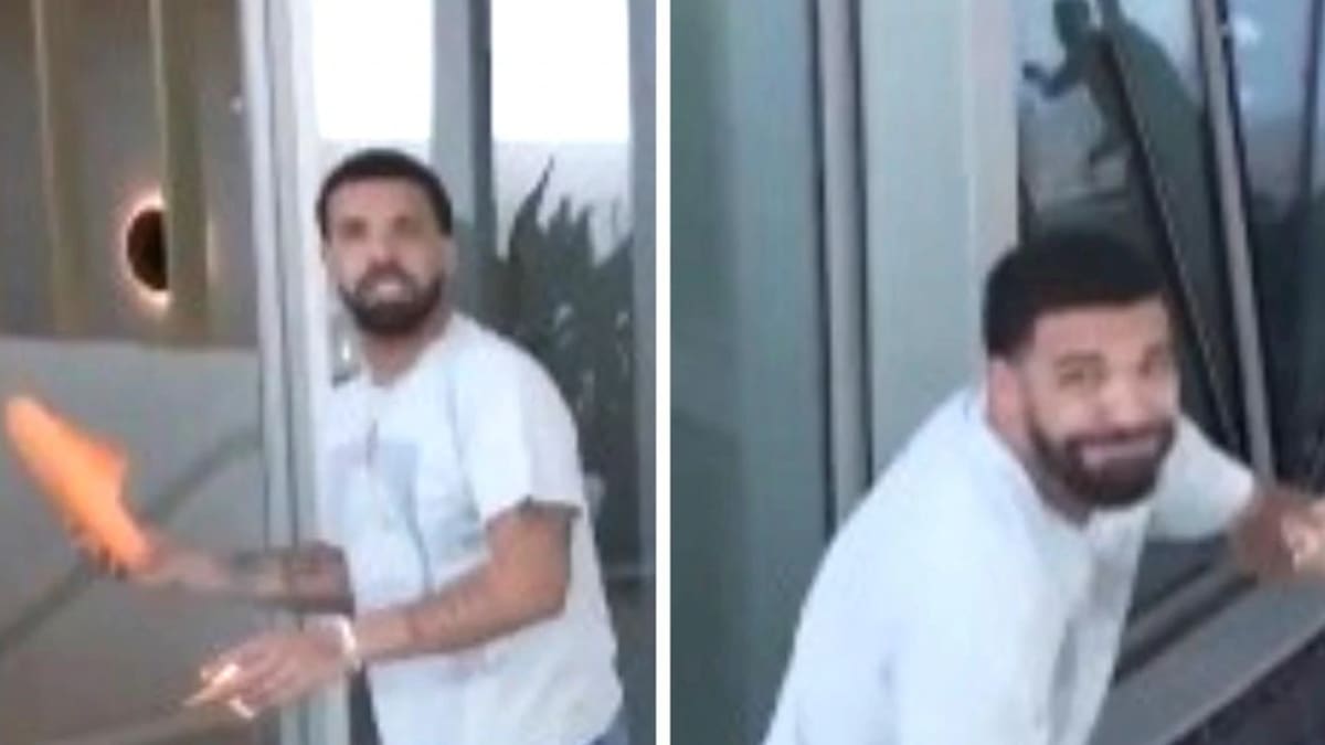 观看：粉丝们喊叫德雷克在酒店房间的无人机视频