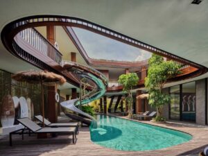 Playful Tropical Modern Home in Bali 设有滑梯、Central Void 和 Serene Pool