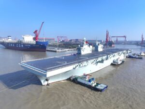 中国新型两栖攻击舰“四川”号首航试验，电磁弹射无人机亮相